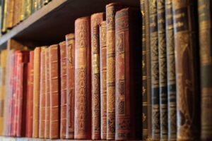 Old books on a library shelf